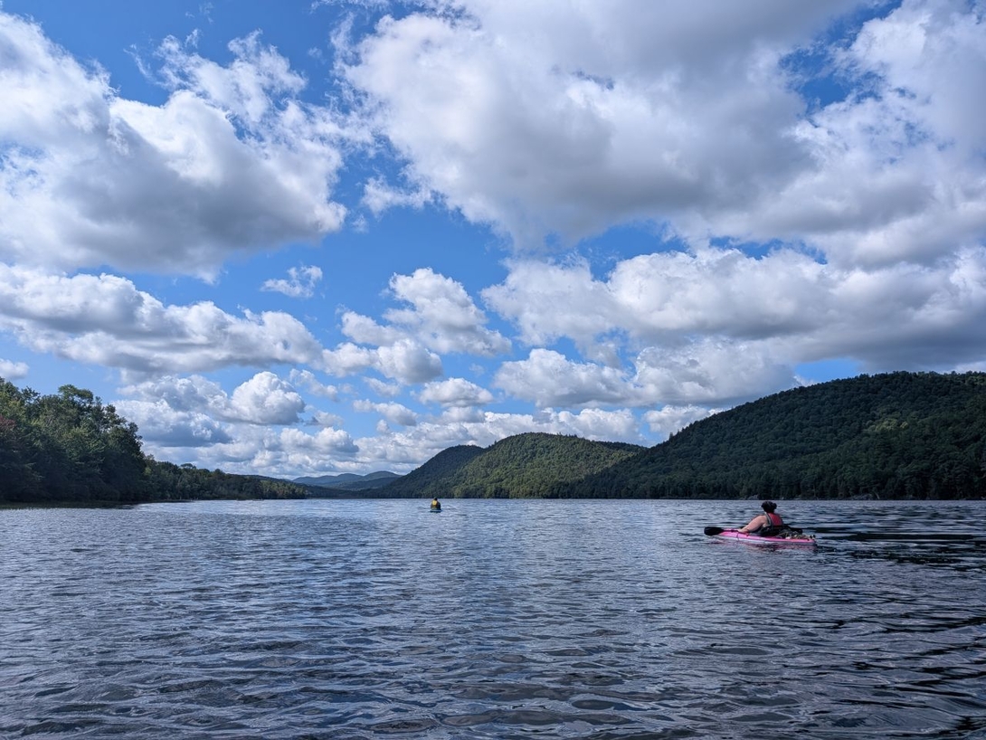 floating across the length  of the lake