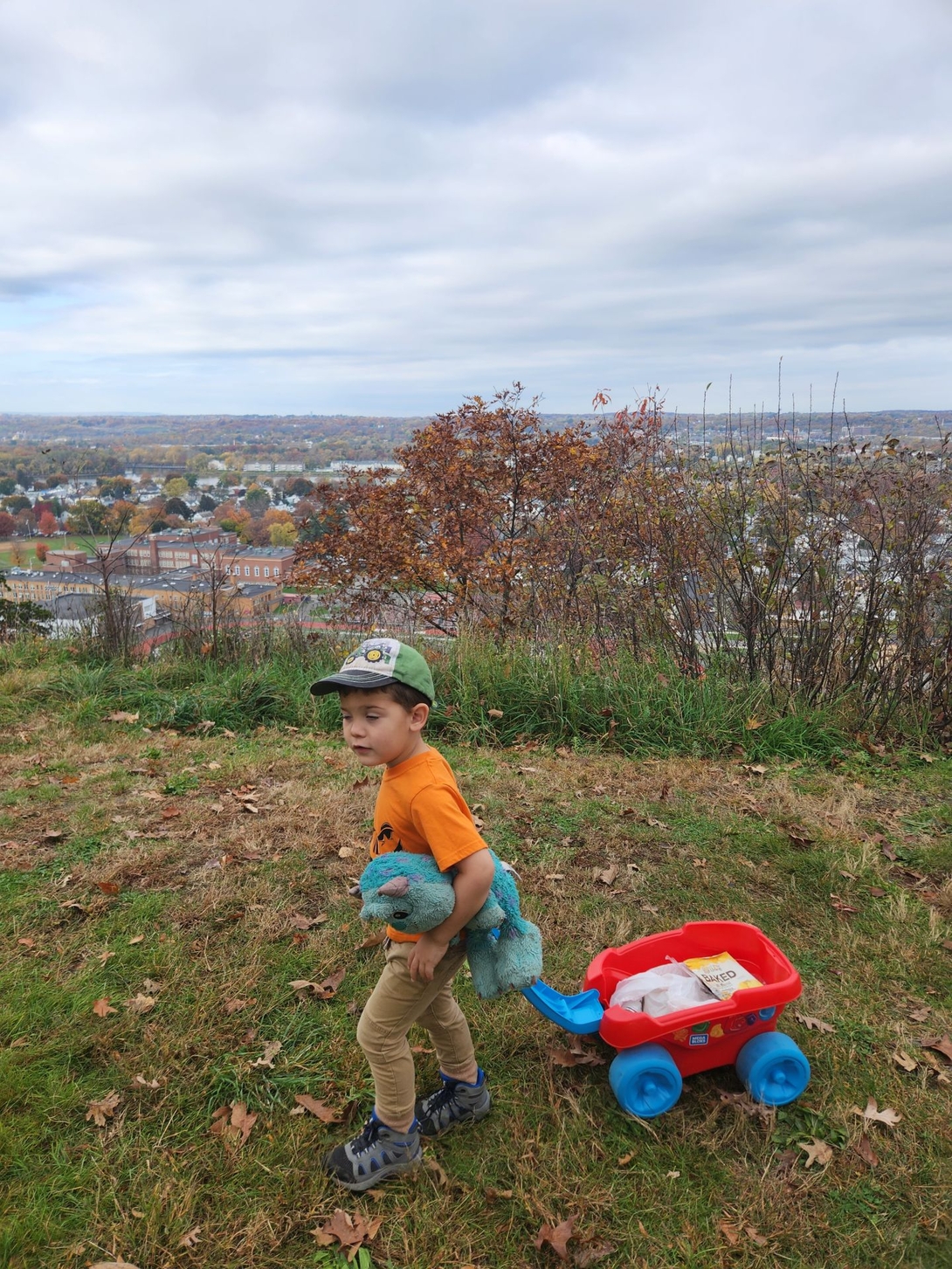quinn picking up trash at the overlook