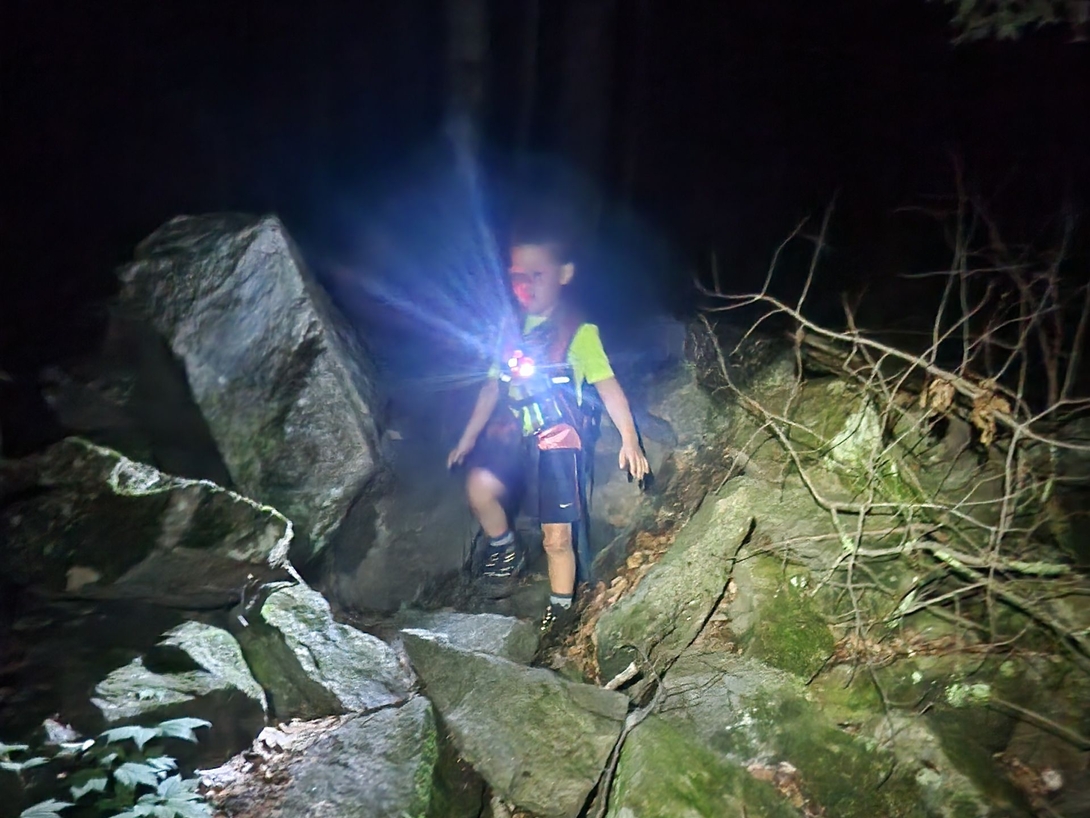 quinn hiking down in the night