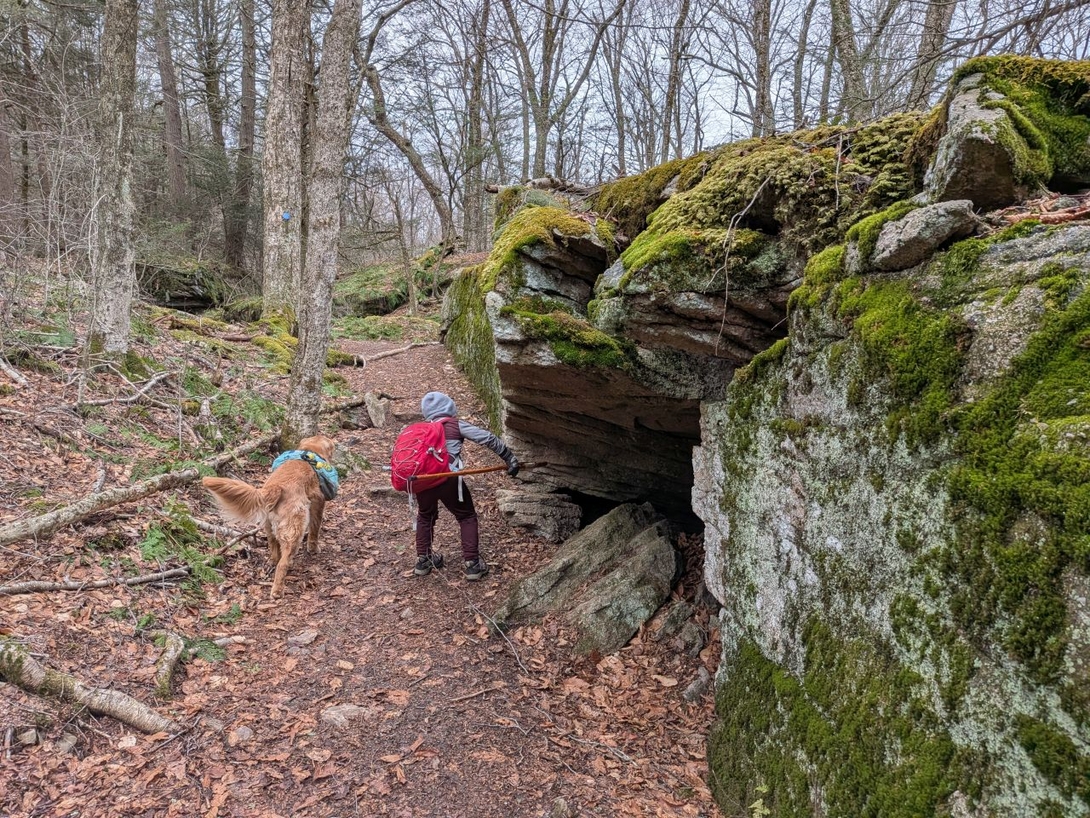hey, it's a cave. i can see through the other side. take my picture