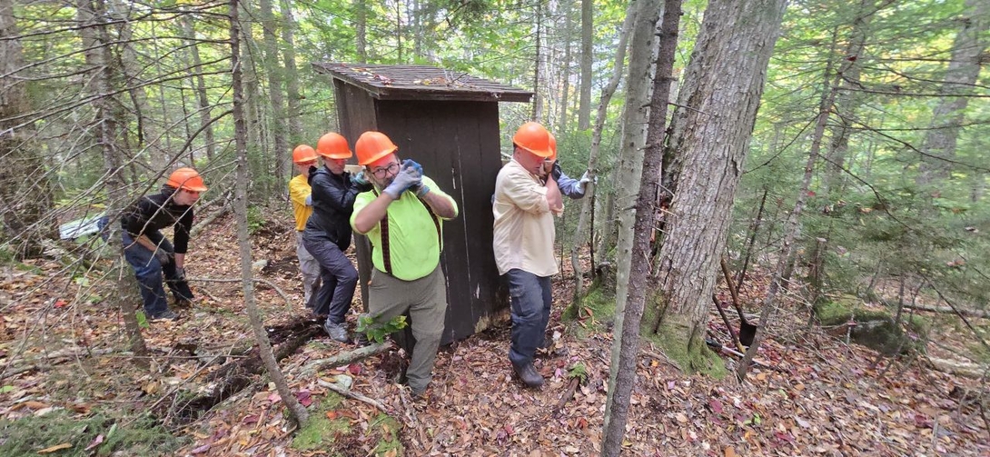 carrying the privy